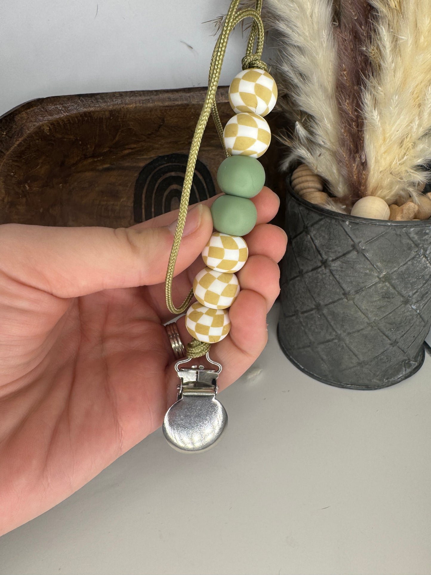 Checker Paci Clip